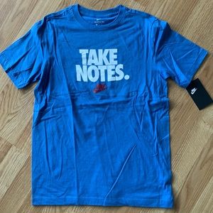 Boys Blue ‘Take Notes’ Nike Tee. Sizes S,M,L, XL available. Brand New Never Worn
